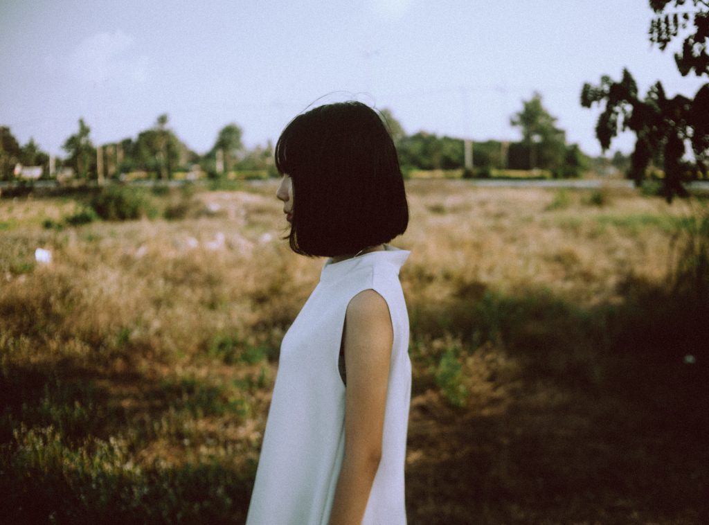sad woman in a field